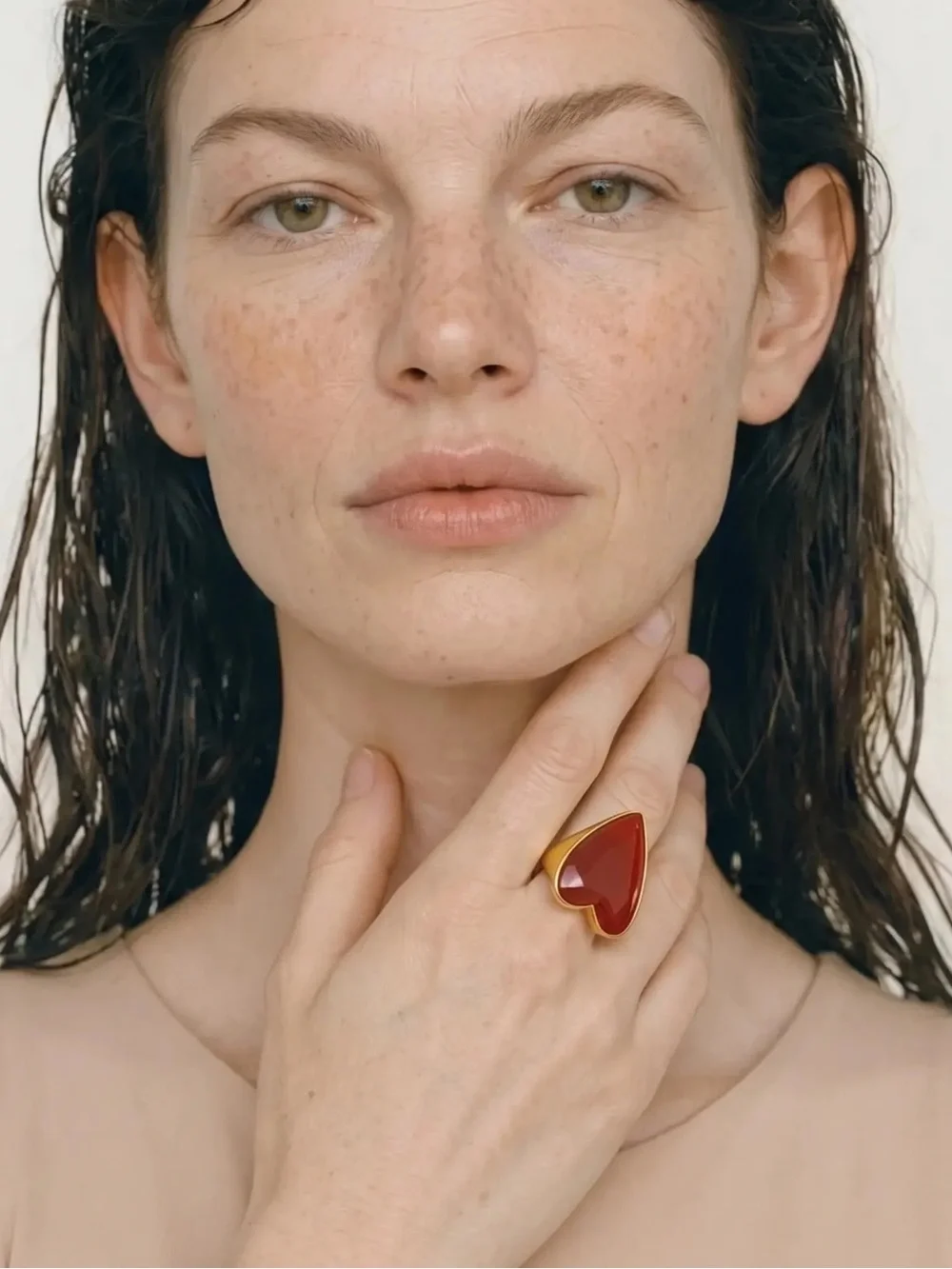 Gold-Tone Heart Cocktail Ring with Red Stone